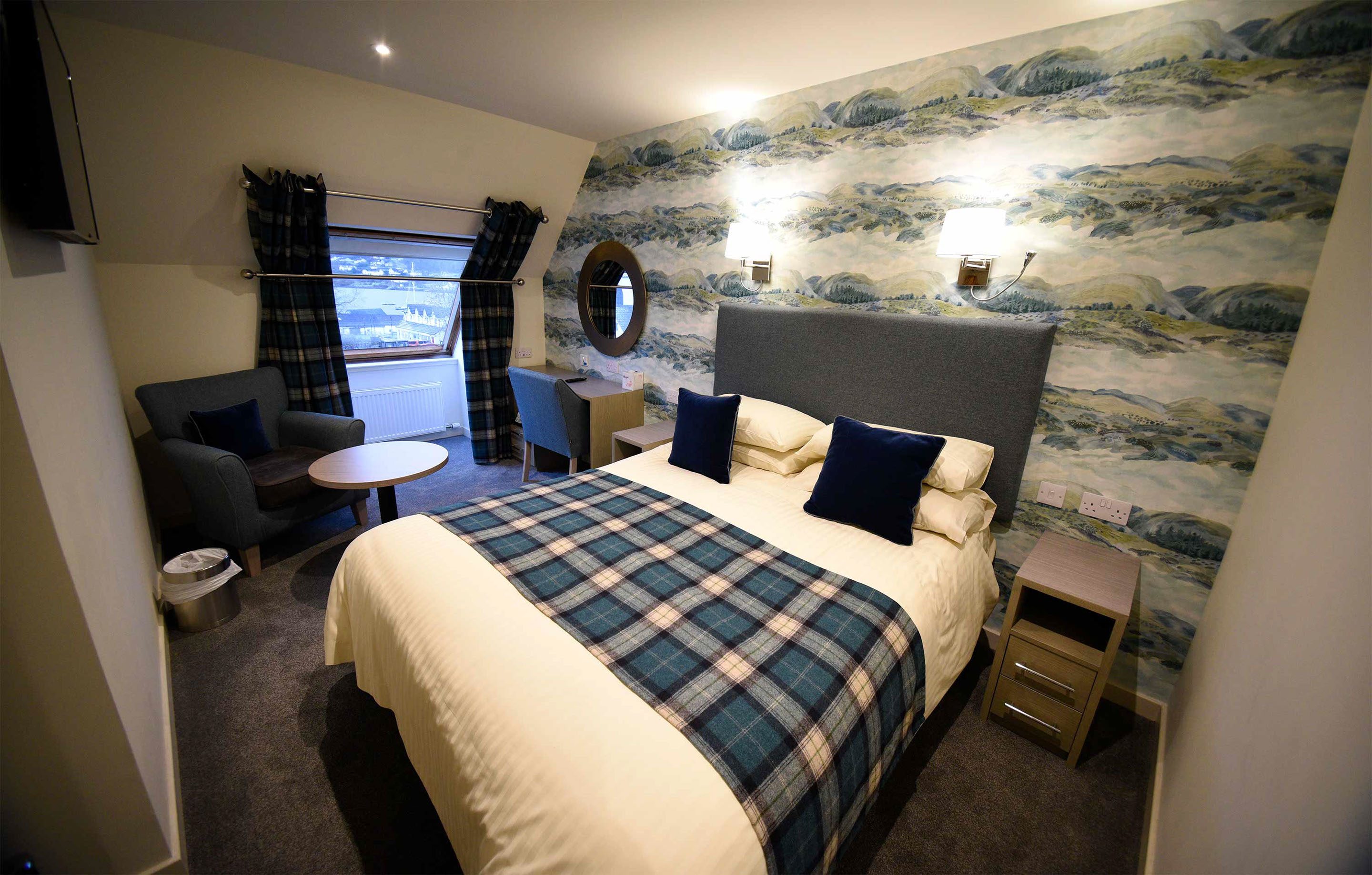 Great value luxury Portree rooms at the Royal Hotel in Portree with inclusive WIFI and private parking seating area