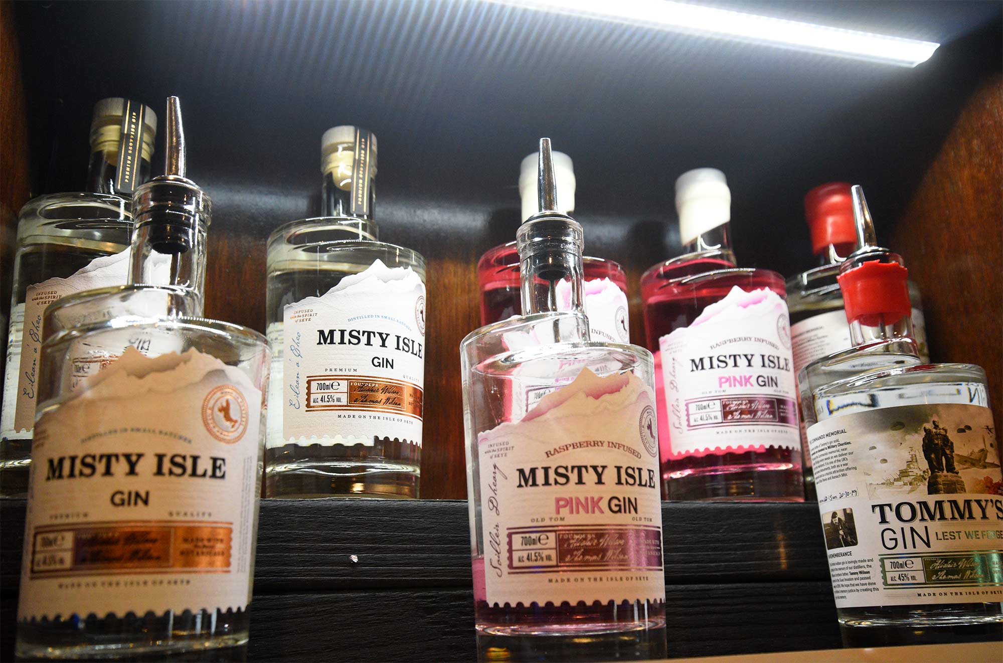 Macnabs Bar in Portree sells Skye Gin and bar meals including burgers fish and chips steak pie and scampi and chips